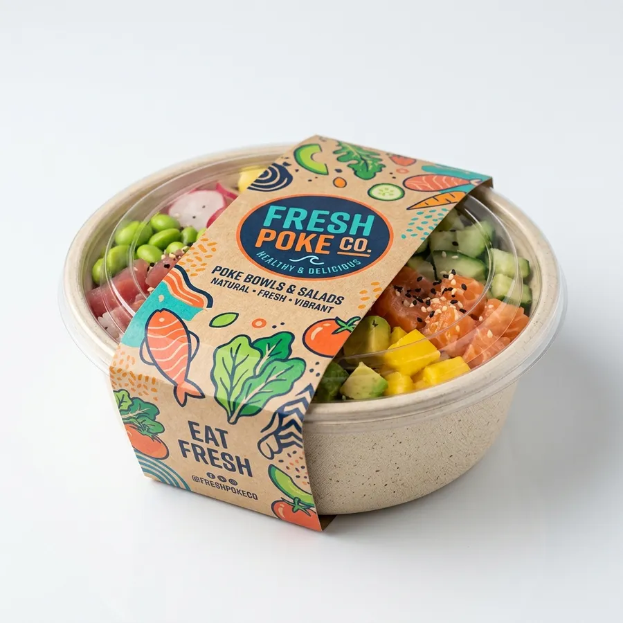 Food-grade paper bowl with printed kraft sleeve holding a fresh poke bowl